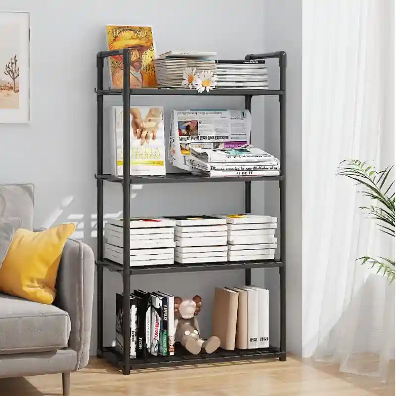 Black metal bookshelf with books and items against a light gray wall.