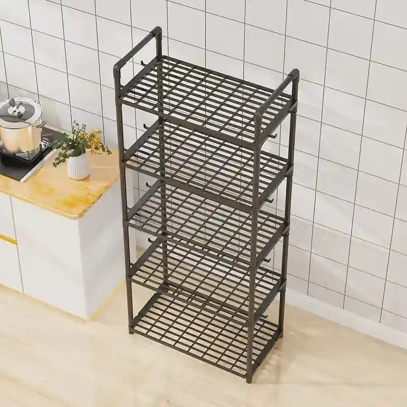 Black metal rack with multiple shelves in a kitchen setting