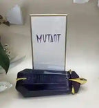 Blue box with gold accents labeled 'Mutant' on a white surface.