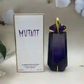 Blue perfume bottle with 'Mutant' packaging on a white surface