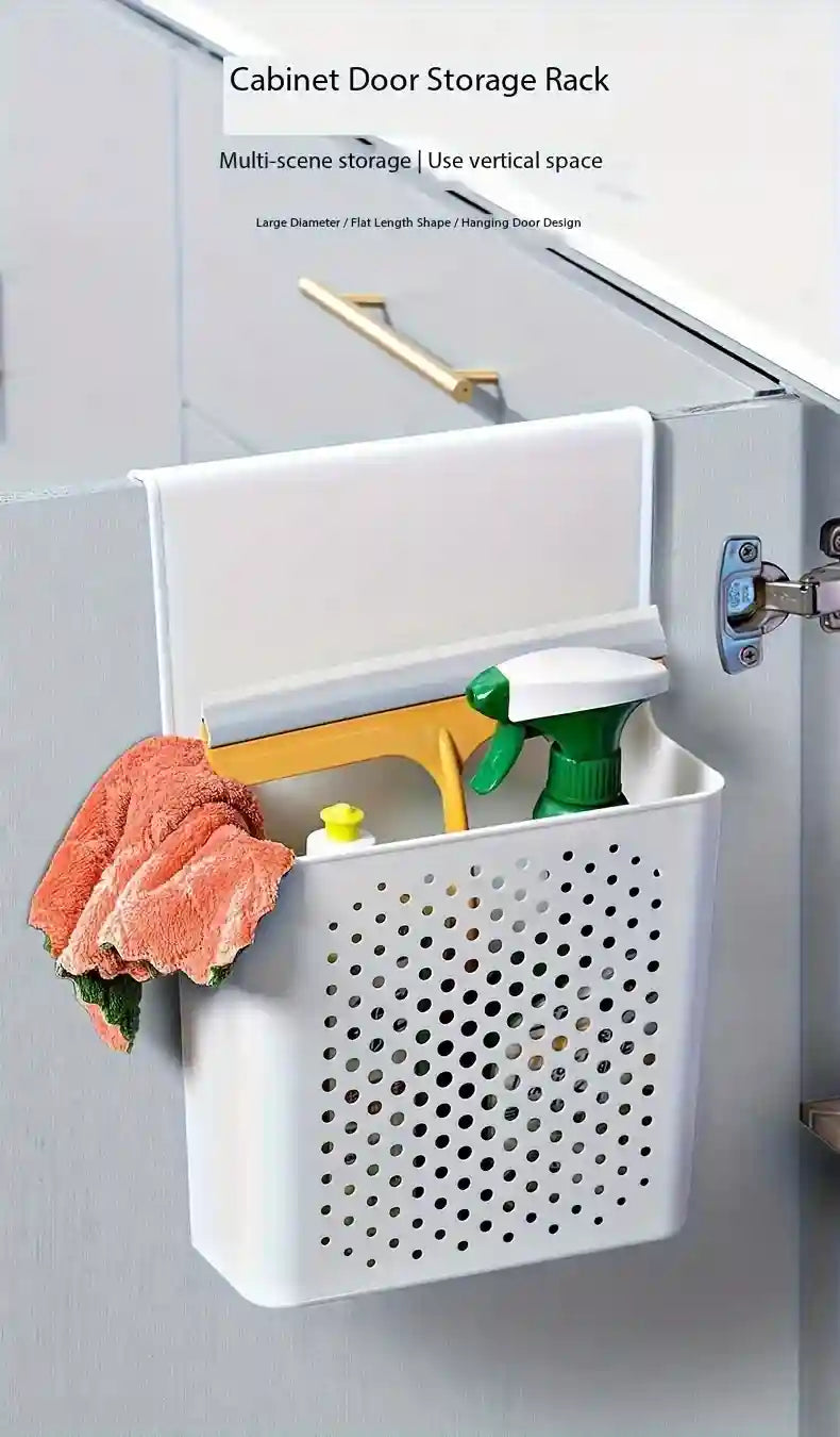 Cabinet door storage rack with cleaning supplies on a white cabinet door.