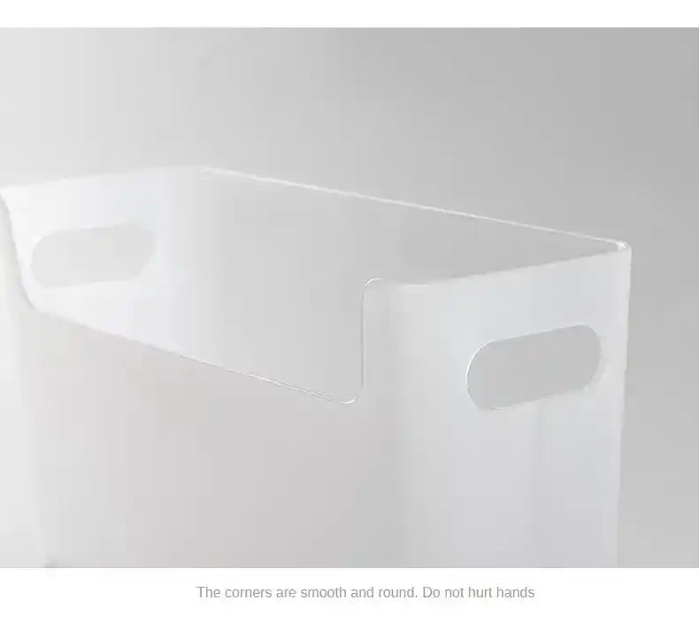 Clear plastic box with rounded corners on a gray background