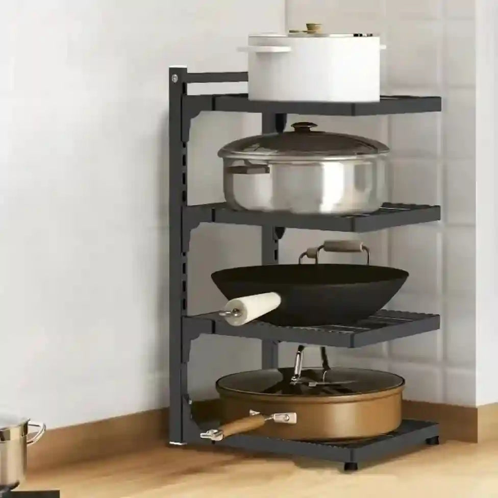 Corner kitchen storage rack with pots and pans on a light wood floor.
