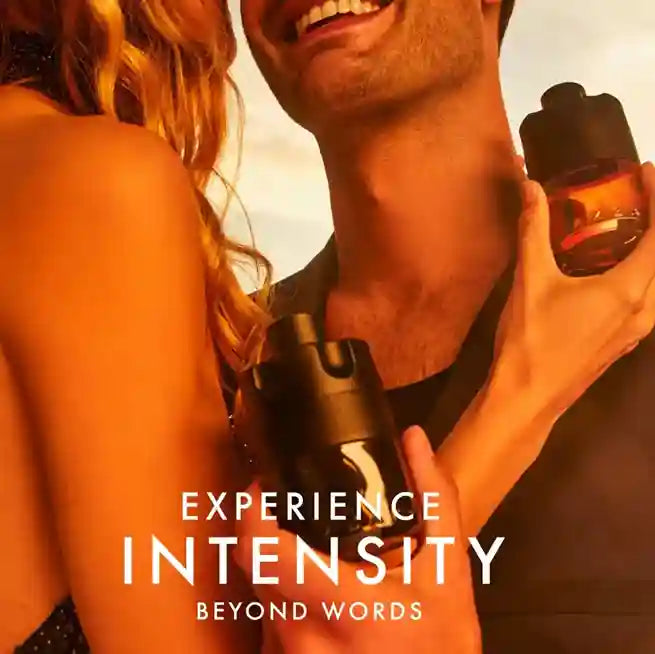 Couple embracing with a bottle of perfume, text 'Experience Intensity Beyond Words'.