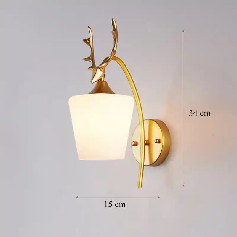 Decorative wall lamp with deer antlers on a gray background
