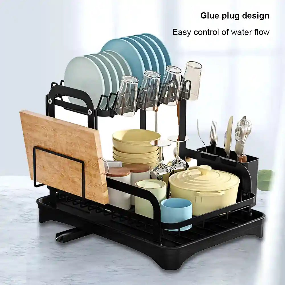 Dish drying rack with various dishes and utensils on a light gray background