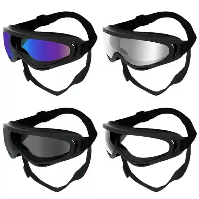 Four pairs of black goggles with different lens colors on a white background