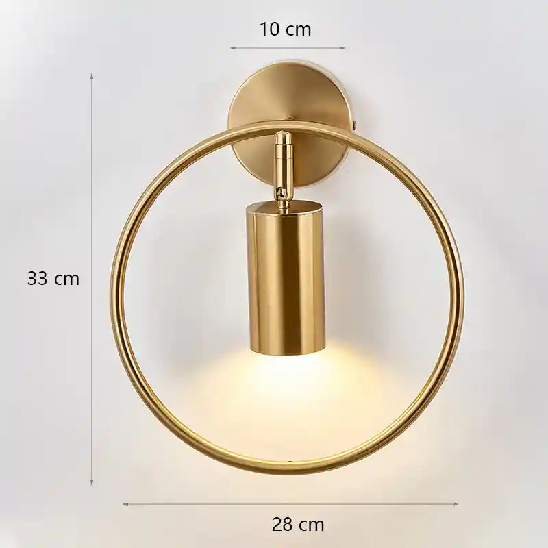 Gold wall lamp with dimensions indicated on a white background