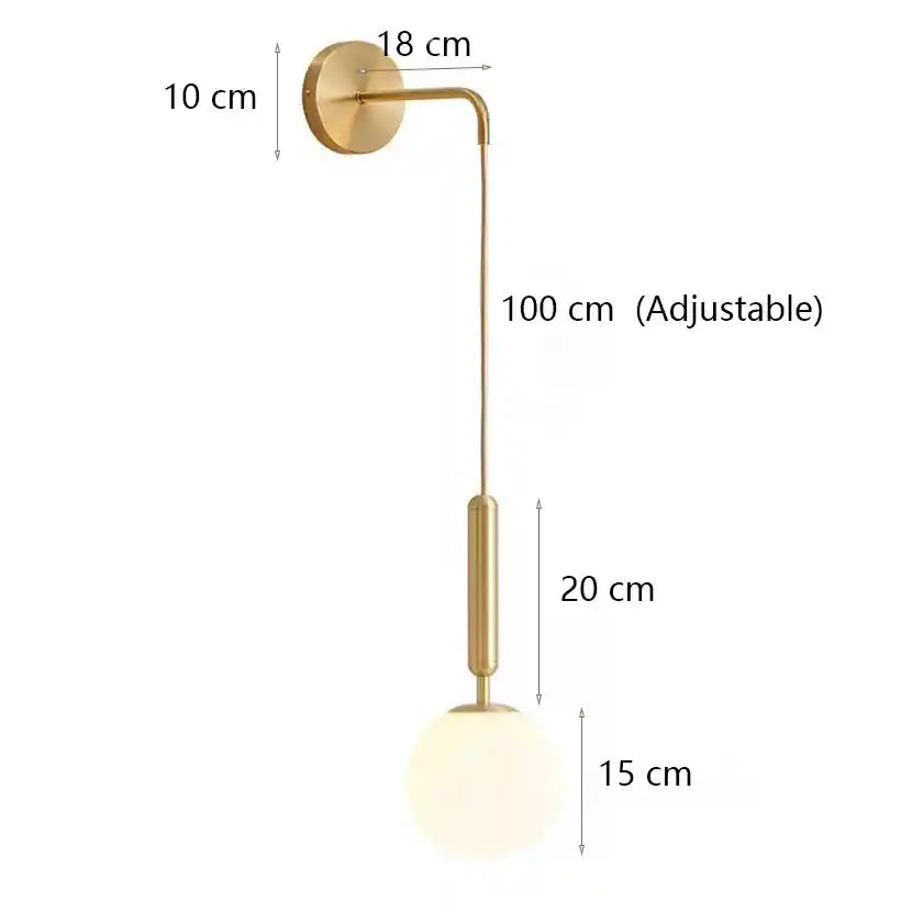 Gold wall lamp with measurements on a white background