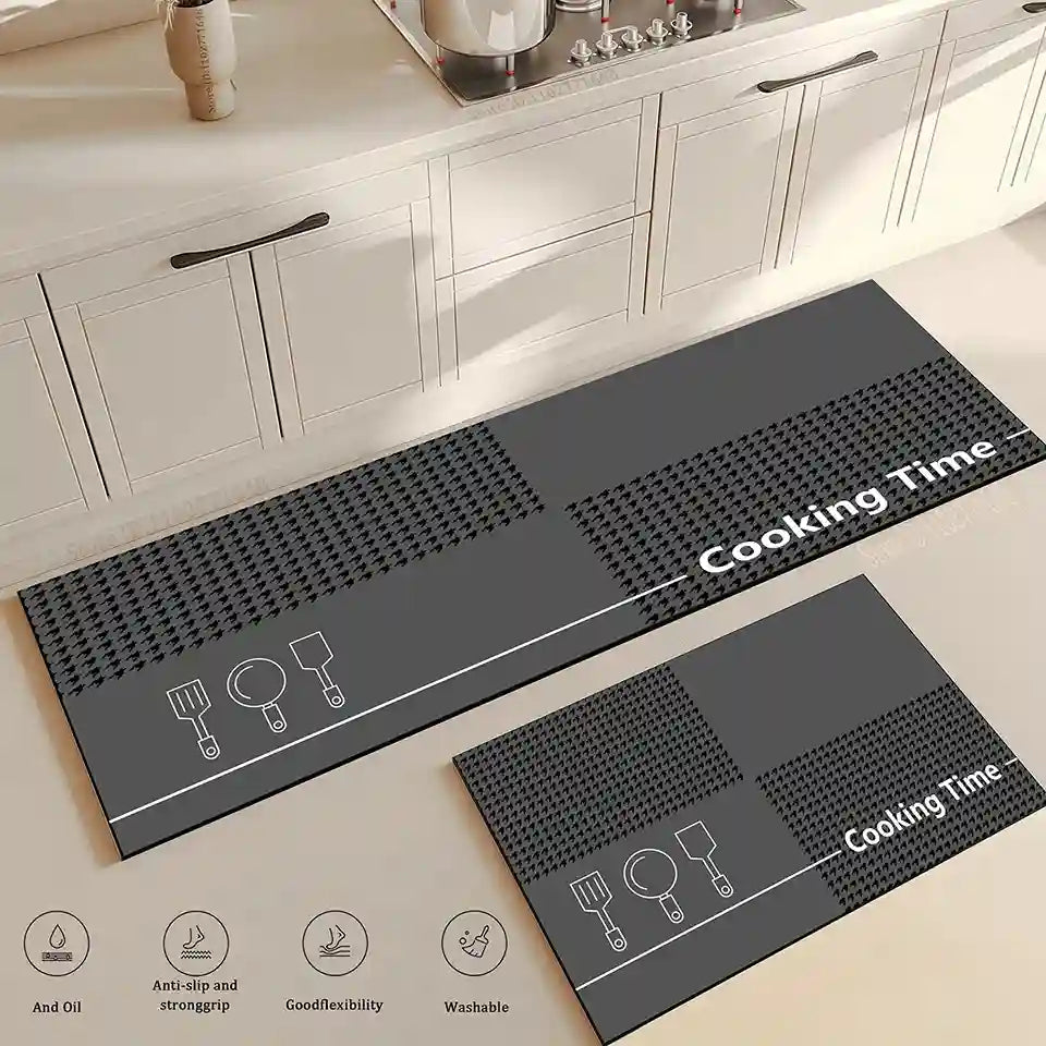 Gray kitchen mat with 'Cooking Time' text and icons on a kitchen floor.