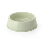 Green ceramic bowl on a white background