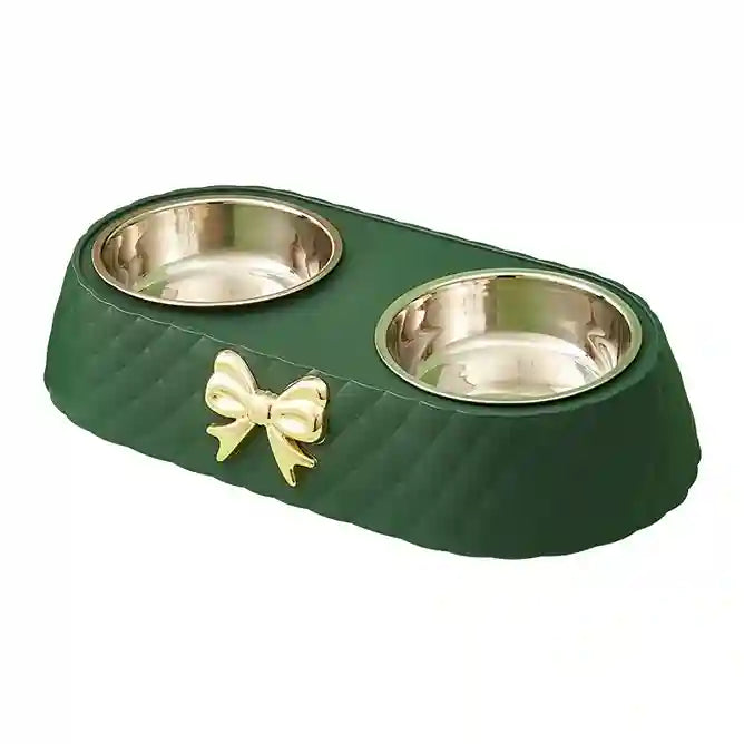 Green double pet bowl with gold bow on a white background