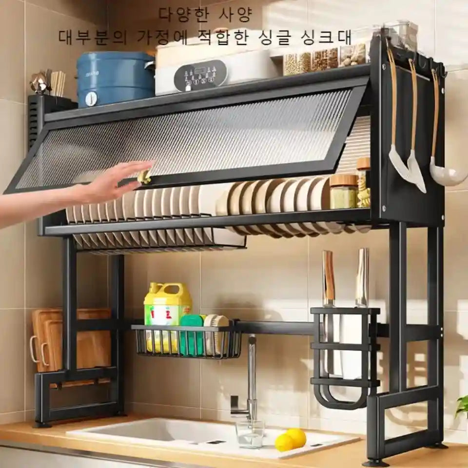 Korean kitchen dish rack with various utensils and containers on a kitchen counter.