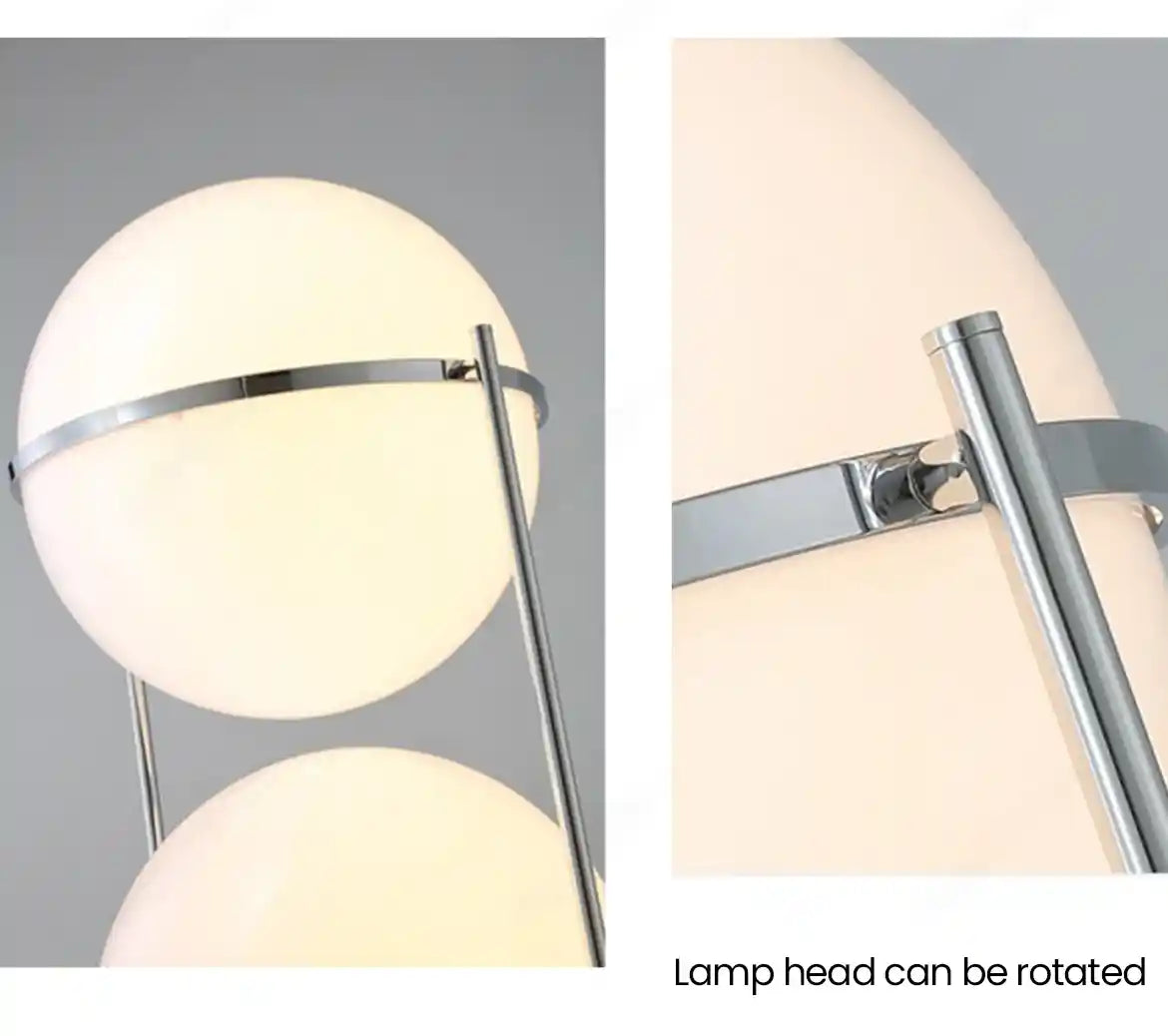 Modern lamp with adjustable head on a gray background