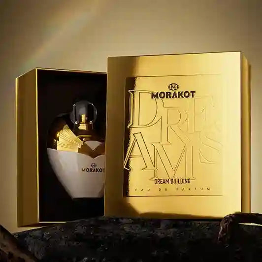 Morakot perfume bottle and packaging with 'Dream Building' text on a gold background