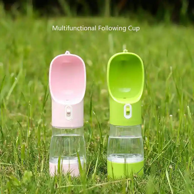 Multifunctional following cup in pink and green on grass