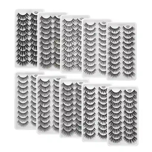 Multiple packages of false eyelashes on a white background