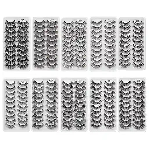 Multiple packages of false eyelashes on a white background