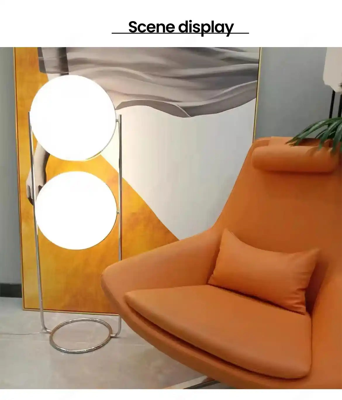 Orange chair with a pillow in a room with a large abstract painting and floor lamp.