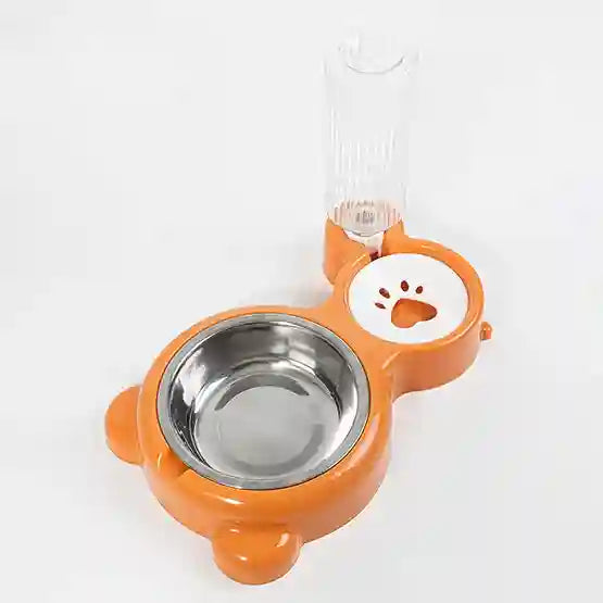 Orange pet bowl with a stainless steel interior on a white background