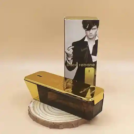 Paco Rabanne perfume bottle and packaging on a beige background