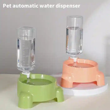 Pet automatic water dispenser with green base and pink stand on a white background