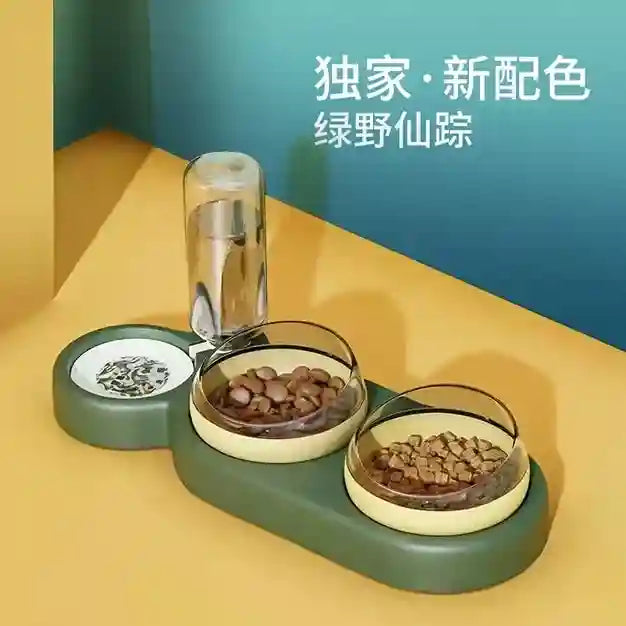 Pet feeding station with three bowls on a yellow surface against a blue wall.
