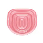 Pink ceramic platter on a white background