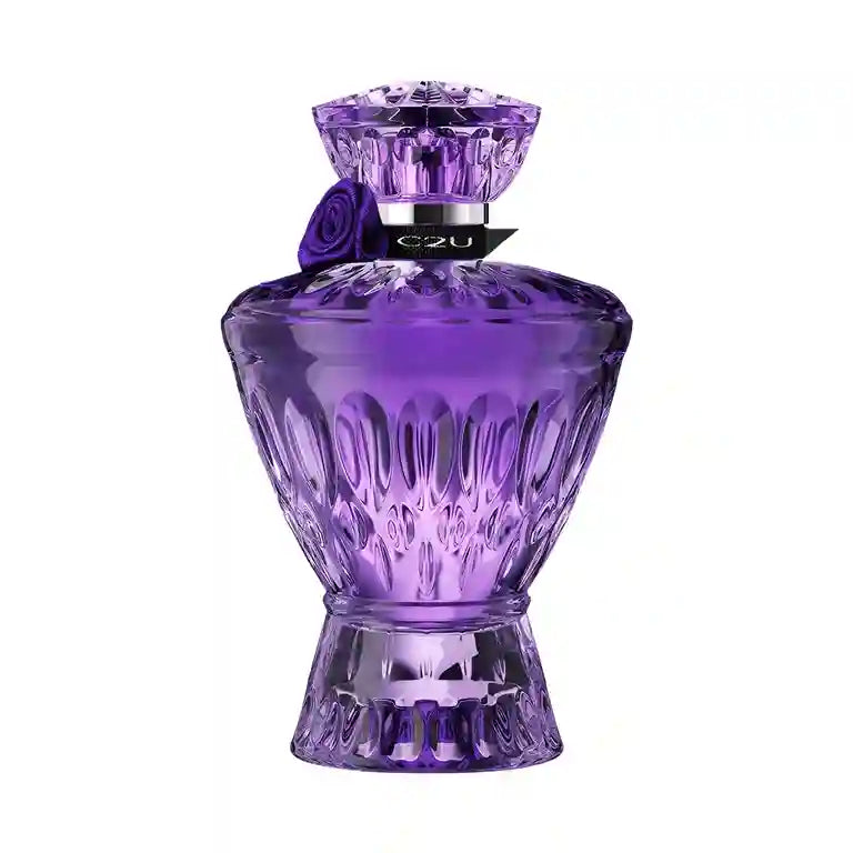 Purple perfume bottle with decorative cap on a white background