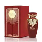 Red and gold perfume bottle with matching box on a white background