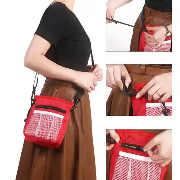 Red crossbody bag with a mesh pocket being used by a person.