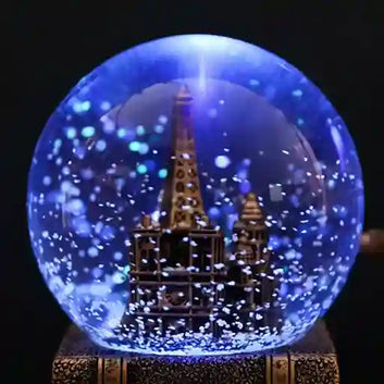 BABBAK’S LTD Retro Eiffel Tower Snow Globe with Lights, Music & Hourglass – Resin Desktop Decor
