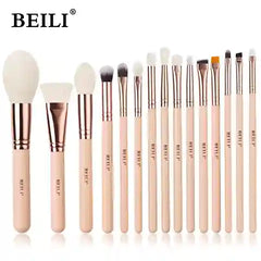 Set of BEILI makeup brushes with beige handles and white bristles on a white background.