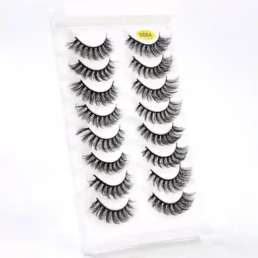 Set of false eyelashes in a clear packaging box on a white background