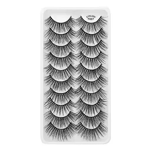 Set of false eyelashes in a clear plastic case on a white background