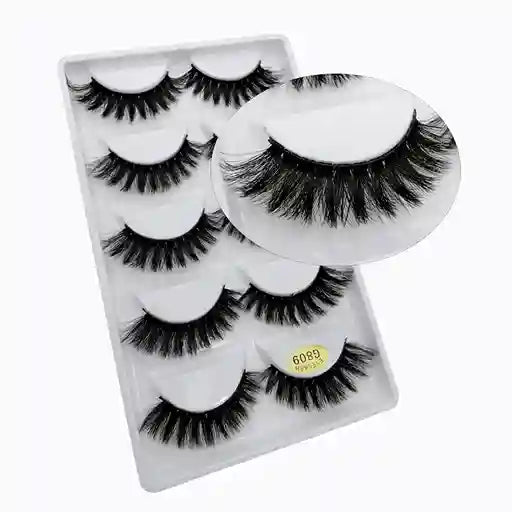 Set of false eyelashes in a packaging case on a white background