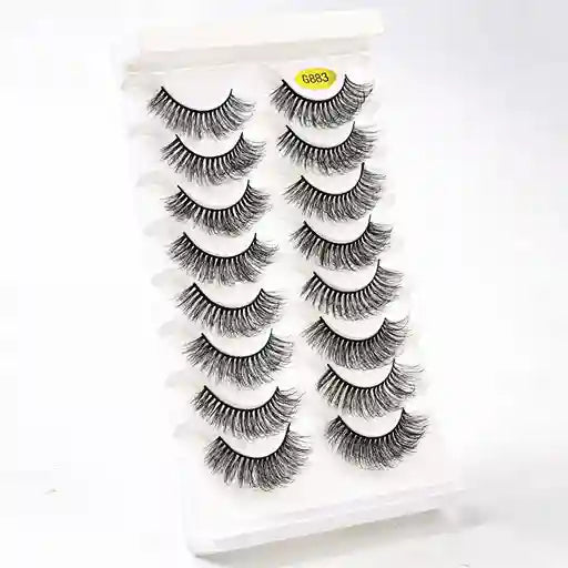 Set of false eyelashes on a white card with a visible brand label.