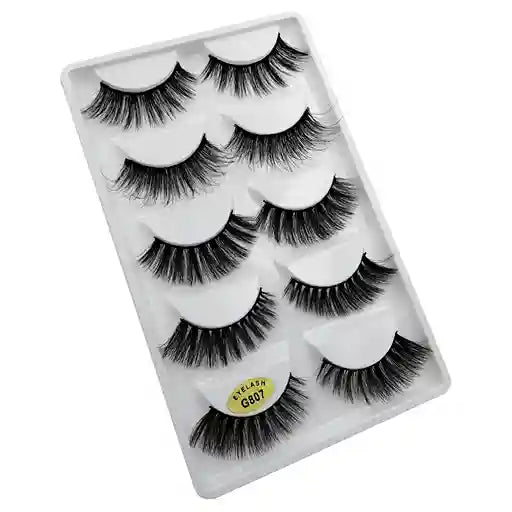 Set of false eyelashes in a clear packaging case on a white background