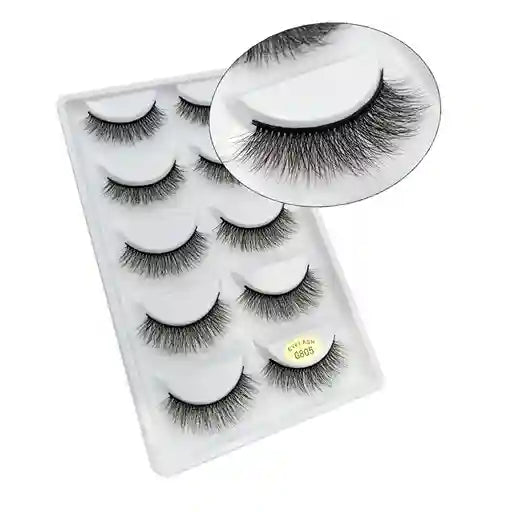 Set of false eyelashes in a clear packaging case on a white background