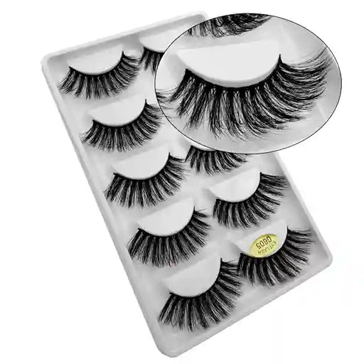 Set of false eyelashes in a clear plastic case on a white background