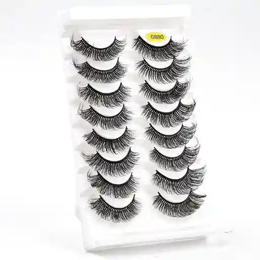 Set of false eyelashes in a packaging case on a white
