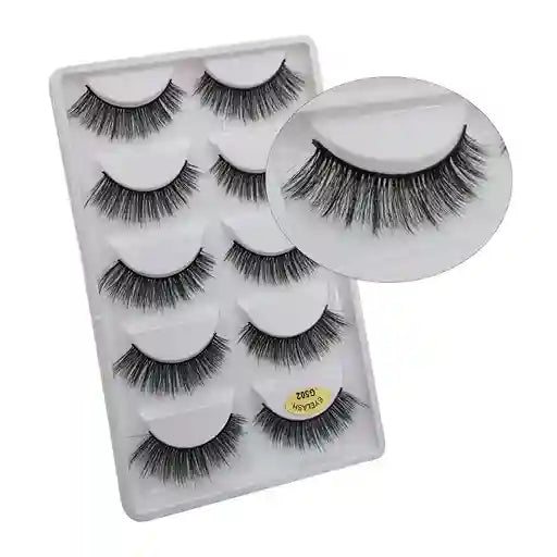 Set of false eyelashes in a packaging case with an additional pair displayed separately.