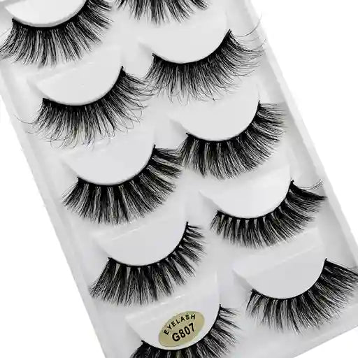 Set of false eyelashes in a packaging tray with visible brand label.