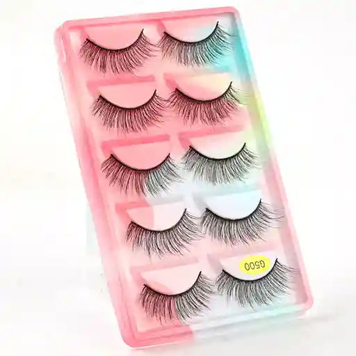 Set of false eyelashes in a pink case with a gradient background