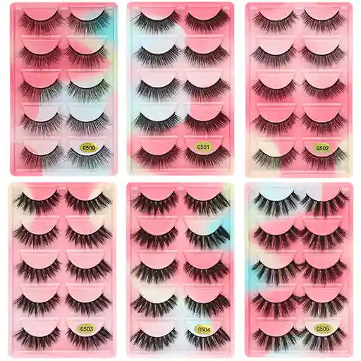 Set of false eyelashes in pink packaging with visible brand name.