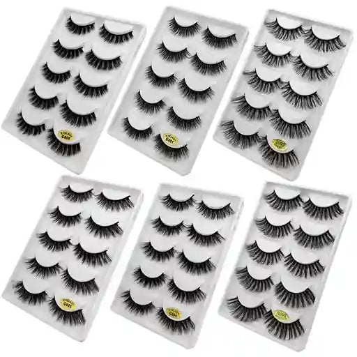 Set of six packages of false eyelashes on a white background