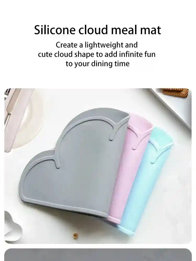 Silicone cloud meal mat in gray, pink, and blue on a white background