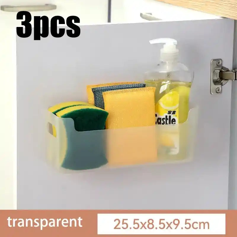 Transparent wall-mounted storage caddy with cleaning supplies on a white cabinet door.