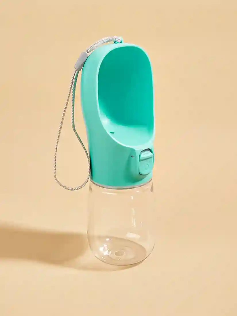 Turquoise pet water bottle with clear base on a beige background