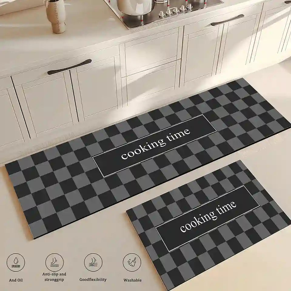 Two checkered kitchen mats with 'cooking time' text on a kitchen floor.
